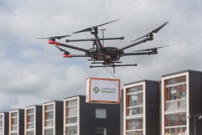 Drone delivering a pharmacy product in Helsinki